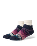 Stance Curren Slipper Sock in the colour Grape shown on a foot shape..
