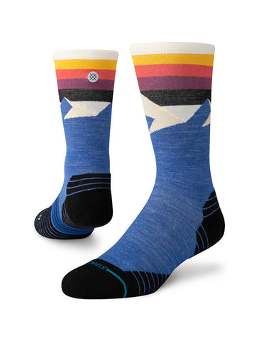 Stance Divided Lines Crew Sock in the colour blue shown on a foot shape..