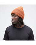 Stance Icon 2 Beanie in the colour Rust shown from the side on a man 