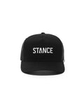 Stance Icon Trucker Hat in the colour black with white logo writing shown from the front