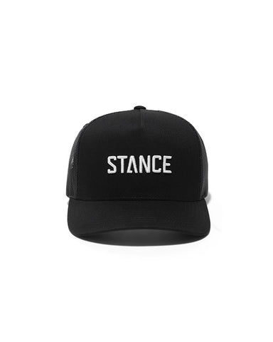 Stance Icon Trucker Hat in the colour black with white logo writing shown from the front