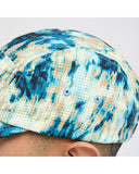 Stance Kinetic Adjustable Ripstop Cap in the colour Teal Camo shown from the side on a man's head