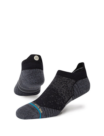 Stance Run Tab Sock in the colour black shown on a foot shape.
