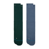 Stance solid mid wool snow sock 2 pack in the colour Pine, shown flat from the underside