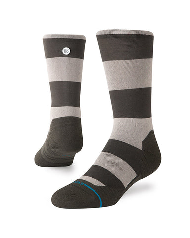 Stance Stack It Up Light Crew Sock in the colour Washed Black shown on a foot shape