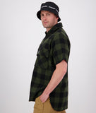 Swanndri Henderson Jacket in the colour Olive Black, shown from the side, on a model