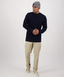 Swanndri Men's Otahu River Merino Crew Neck in the colour Navy, shown from the front, on a model