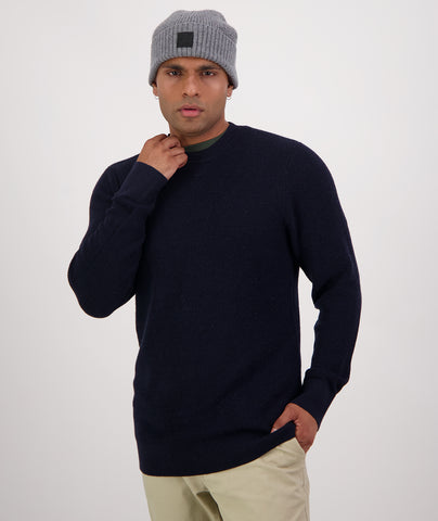 Swanndri Men's Otahu River Merino Crew Neck in the colour Navy, shown from the front, on a model