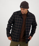 Swanndri Taranaki Tailor Shirt in the colour Black Charcoal, shown from the front, on a model