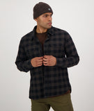 Swanndri Taranaki Tailor Shirt in the colour Black Charcoal, shown from the front, on a model
