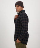 Swanndri Taranaki Tailor Shirt in the colour Black Charcoal, shown from the side, on a model