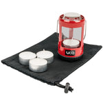 UCO Mini Candle Lantern Kit in the colour red with a black drawstring bag