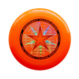 An orange Discraft Ultra-Star 175g flying disc or sportdisc