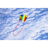 An image of a HQ Sleddy Rainbow foldable kite flying against a cloudy background