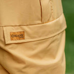 Hilltrek Braemar Single Ventile Smock with single layer organic cotton ventile fabric in Survival colour showing detail of the "Organic Ventile" label on the kangaroo pocket.