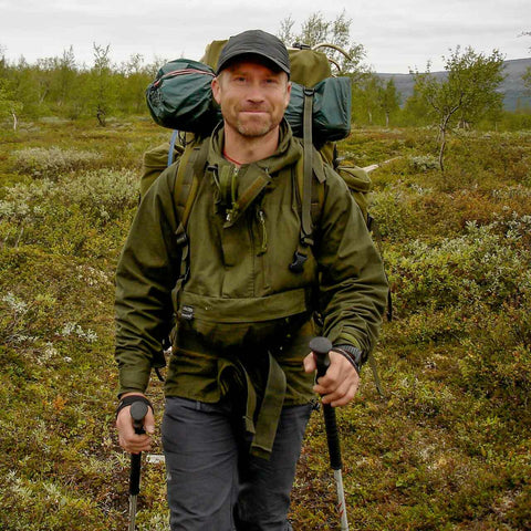 Hilltrek Braemar Single Ventile Plus Smock with single layer ventile fabric in Olive Green colour showing the smock in action with happy grinning Hilltrek customer Nicolas Roggen.