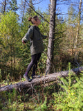 Attempting to dance on a sloping log wearing a Hilltrek Braemar SV Smock in the colour Olive green