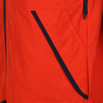 Hilltrek Talorc Organic Hybrid Jacket in Blaze/Orange colour showing hand warmer pocket detail.
