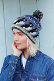 Pachamama Circus Of Puffins Bobble Beanie on model