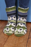 Pachamama Flock Of Sheep Slipper Socks on wooden flooring
