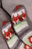 Pachamama Skulk Of Foxes Sofa Socks twitching on a grey sofa. Never buy a grey sofa - they are so dull!