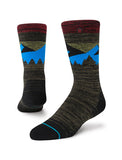Stance Divide Crew Socks in the colour Red shown on a foot shape..