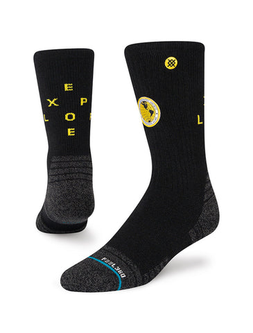 Stance Exploration Crew Socks in the colour Black shown on a foot shape..